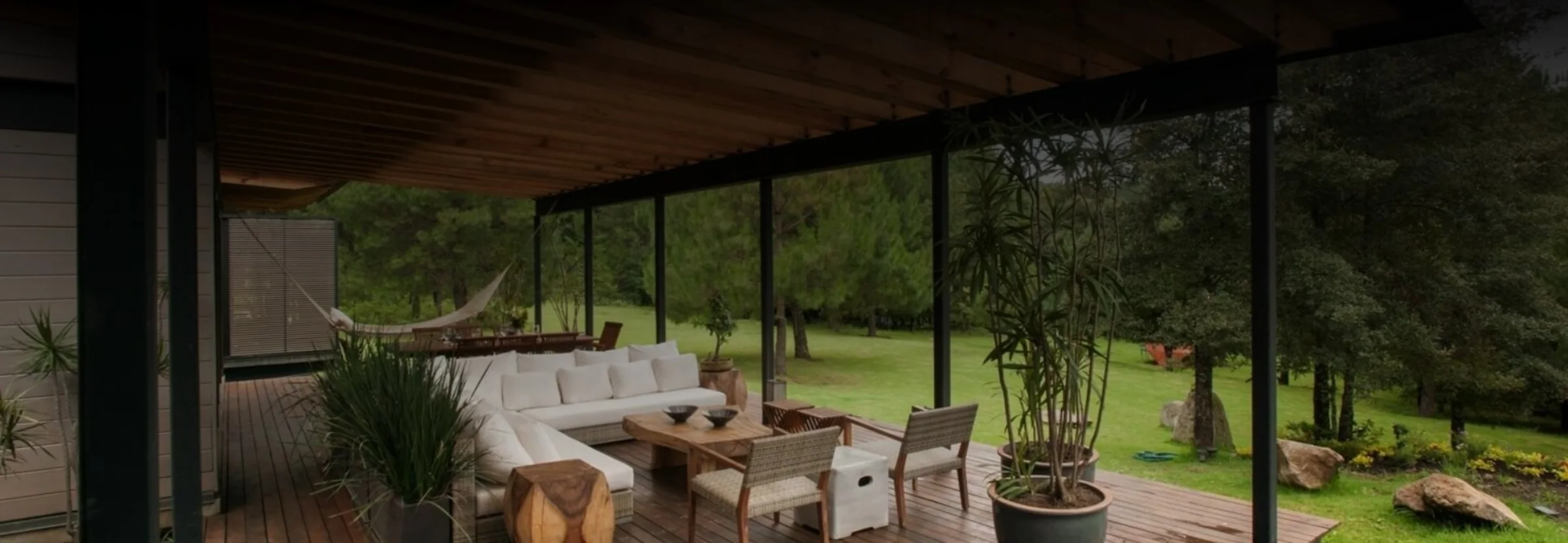 A covered outdoor living space built by Stillpoint Builders
